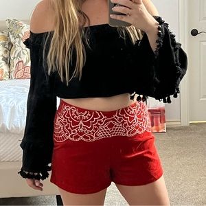 Fiery red shorts.